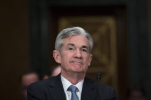 Powell Signals Patience on Inflation, Notes Strong Economy